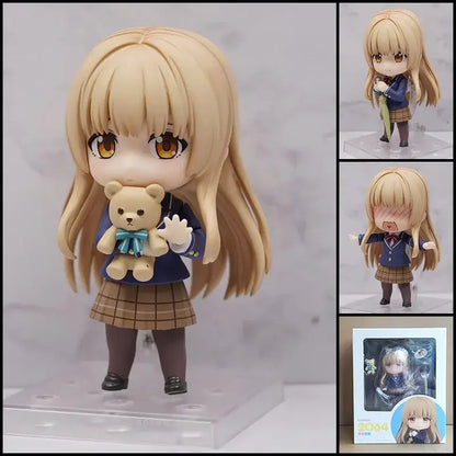 Chibi figure of roxy migurdia from mushoku tensei wearing navy blazer and plaid skirt holding beige teddy bear with teal ribbon