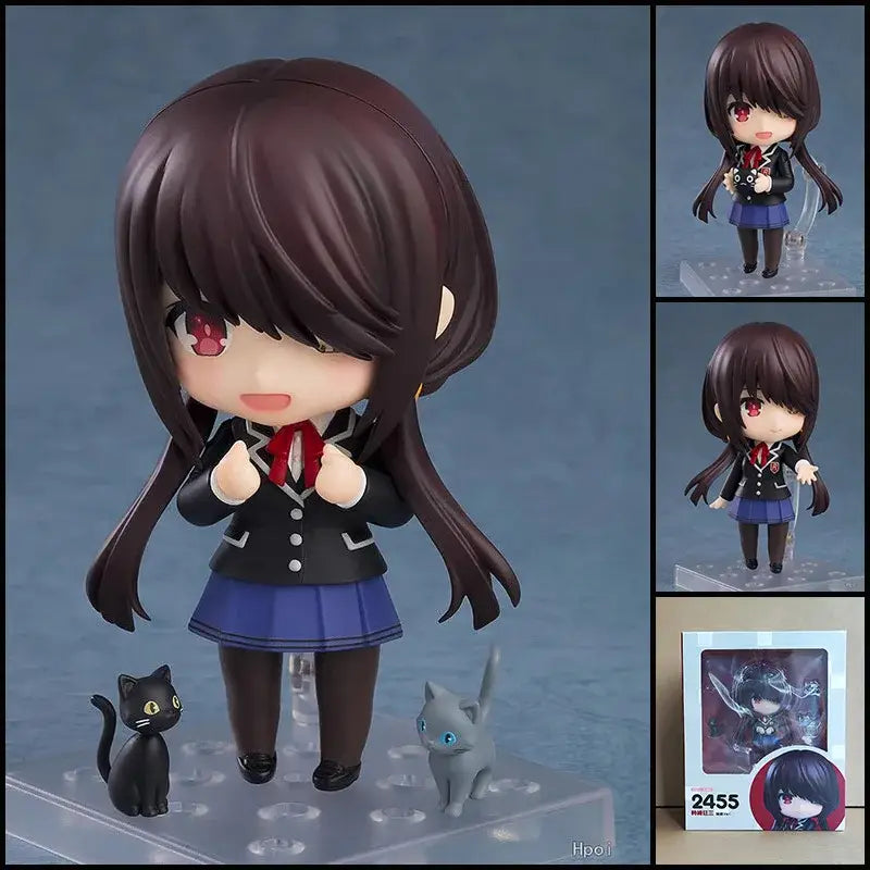 Brown-haired roxy migurdia figure in black and blue school uniform with red ribbon and two small cats from mushoku tensei