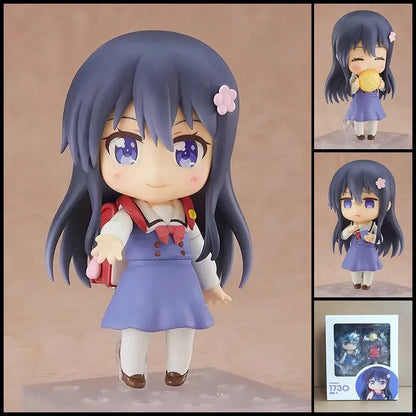 A chibi roxy migurdia figure from mushoku tensei in navy-blue school uniform with posable face swap feature