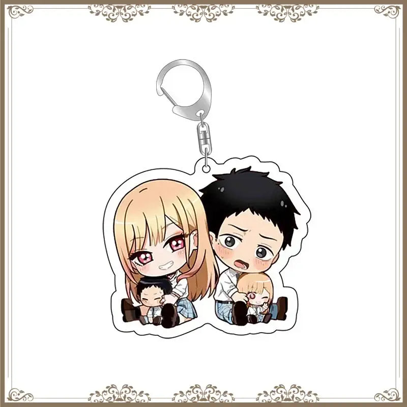 Chibi-style kitagawa marin acrylic bag tag keychain with blonde and black-haired anime characters holding children