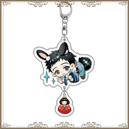 Clear acrylic bag tag featuring kitagawa marin chibi with black hair bunny ears and red japanese doll charm