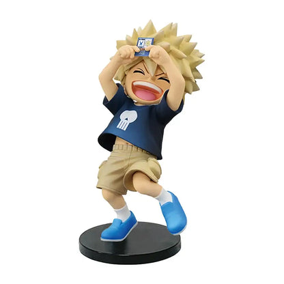 Blonde-haired hero academia action figure in durable pvc wearing navy shirt with skull logo and beige shorts on black base