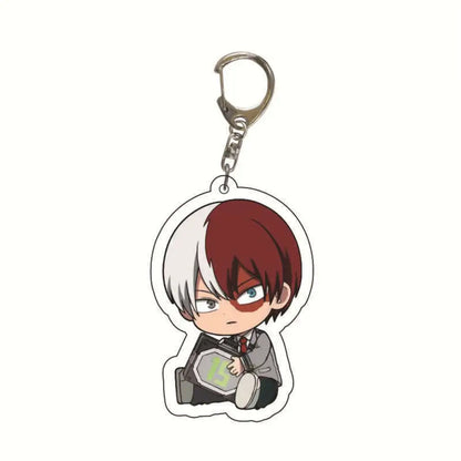 Translucent acrylic hero academia keychain featuring a chibi character with half red and white hair holding device marked 15