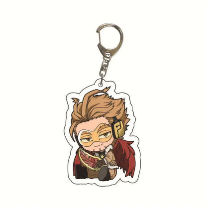 Chibi-style hero academia acrylic keychain with spiky brown hair, gold-rimmed glasses, and red feathered cape bag charm