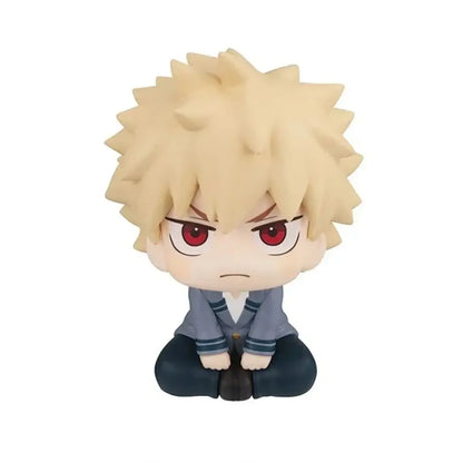Chibi-style bakugo pvc figure with spiky blonde hair and red eyes wearing gray school uniform for hero academia fans