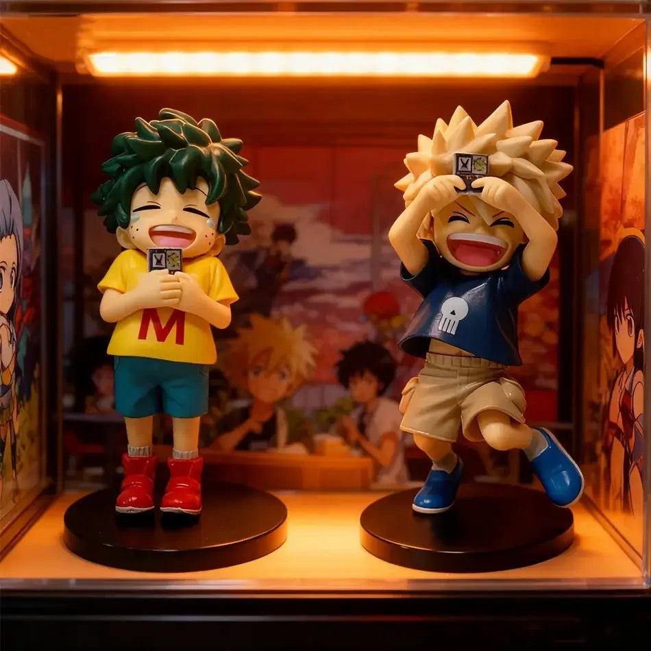 Two colorful detailed My Hero Academia chibi pvc figurines with spiky hair on black circular bases in display case