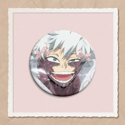 A circular hero academia dabi button pin featuring an anime character with white hair blue eyes and stitched face with pink bows