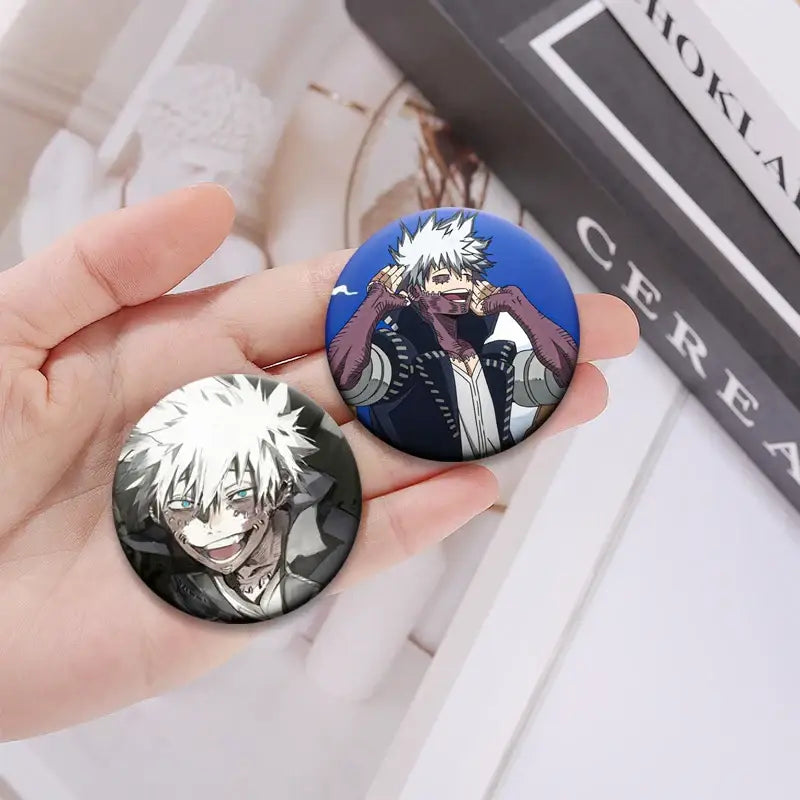 Two hero academia dabi button pins featuring a white-haired grinning character on dark and blue backgrounds