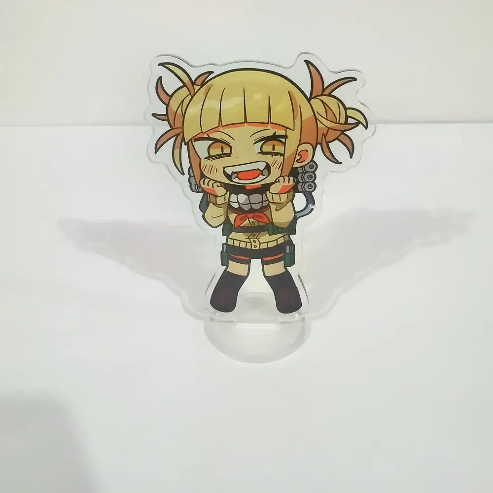 Clear acrylic figure stand featuring chibi style blonde pigtail character in green beige outfit from hero academia