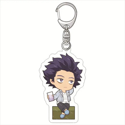 Silver-toned hero academia acrylic keychain featuring a chibi character with purple hair sitting on a green block holding a pink drink