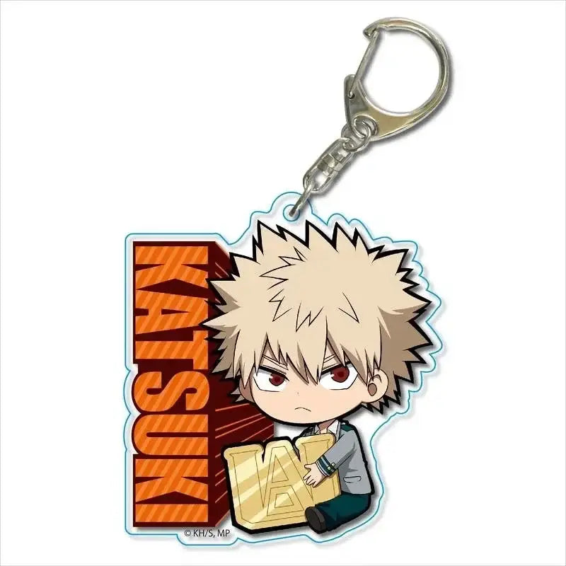 My Hero Academia acrylic keychain featuring chibi Bakugo with spiky blonde hair holding golden UA emblem zinc alloy charm