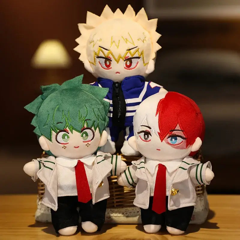 Three hero academia plush dolls with embroidered faces and colored spiky hair wearing school uniforms soft plush toys