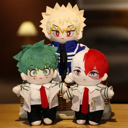 Three hero academia plush dolls with embroidered faces and colored spiky hair wearing school uniforms soft plush toys