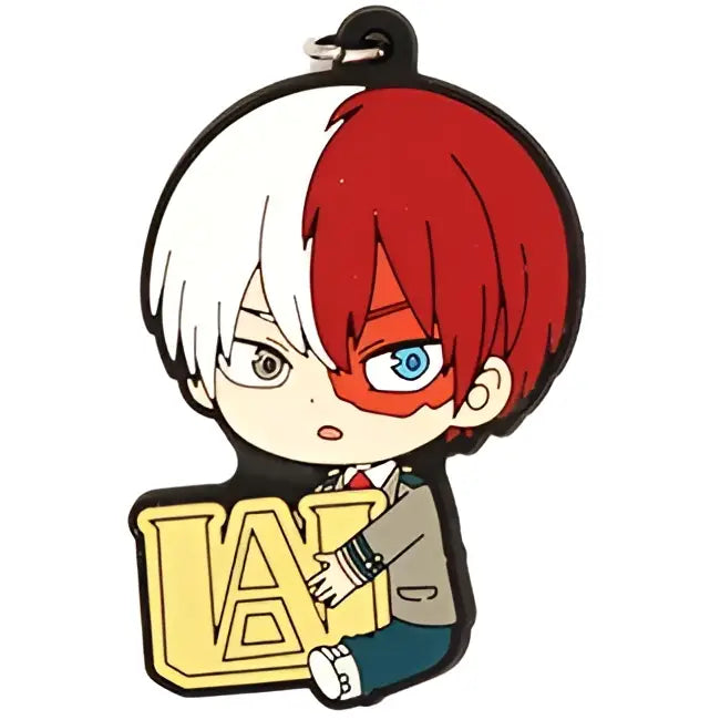 My Hero Academia Deku rubber keychain featuring red and white half-face character with blue eyes holding gold lap emblem
