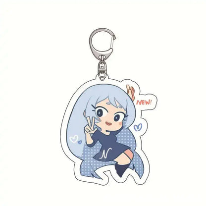 A translucent blue acrylic keychain featuring chibi izuku midoriya from hero academia making a peace sign