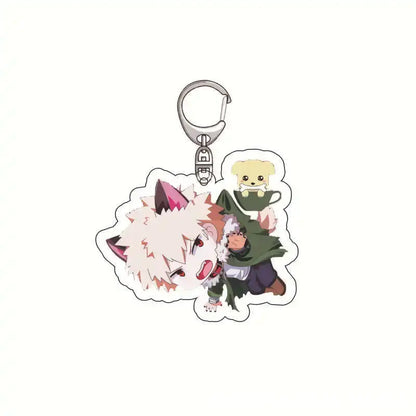 White and pink acrylic keychain featuring izuku midoriya and characters from hero academia with a small yellow dog design