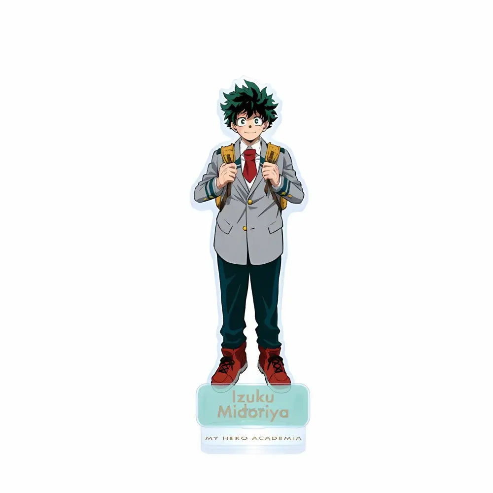 A clear acrylic standee of izuku midoriya in school uniform with green hair red tie gray blazer for display piece