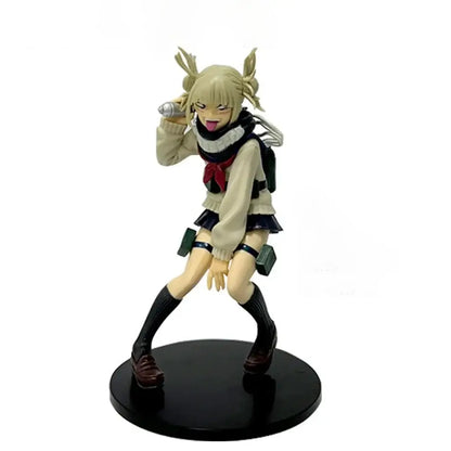Beige and black pvc hero academia anime figure of blonde midoriya izuku with twin ponytails holding silver object to ear
