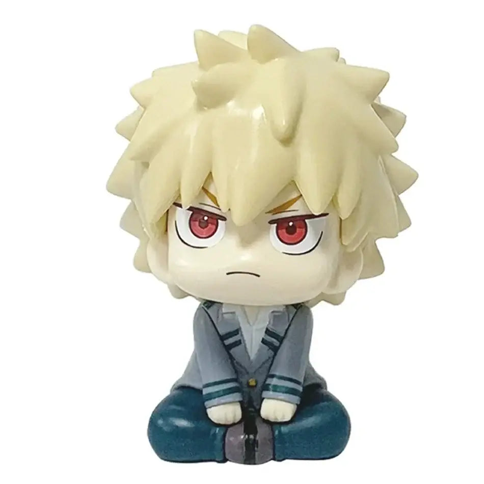 Chibi-style bakugo anime figure with spiky blonde hair and red eyes in gray school uniform from hero academia midoriya izuku series