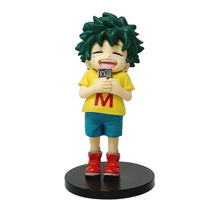 A cheerful green-haired midoriya izuku hero academia figure collection model in yellow shirt and blue shorts on black base