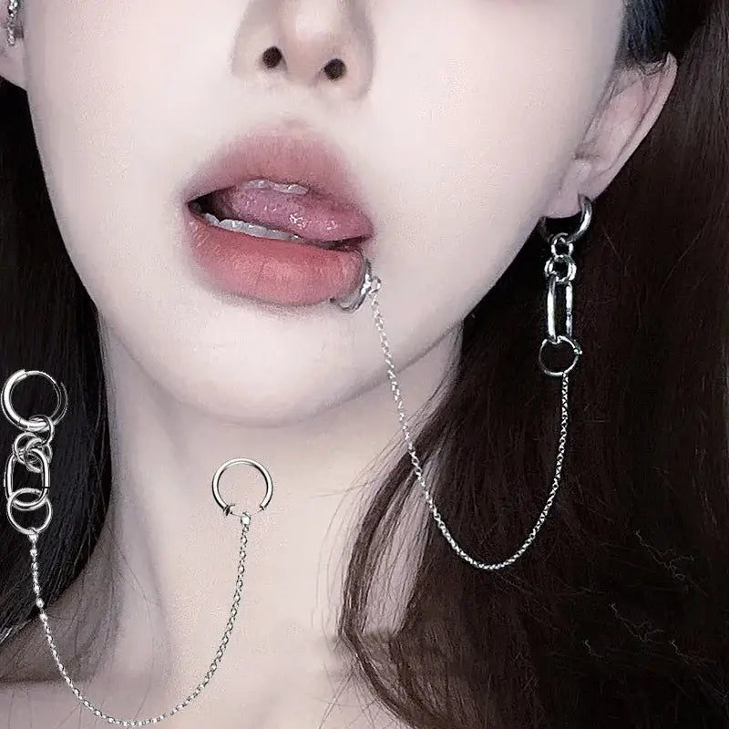 Silver chain lip clip earring with interlocking rings and dangling pendant from nana okazaki shinichi punk chain set