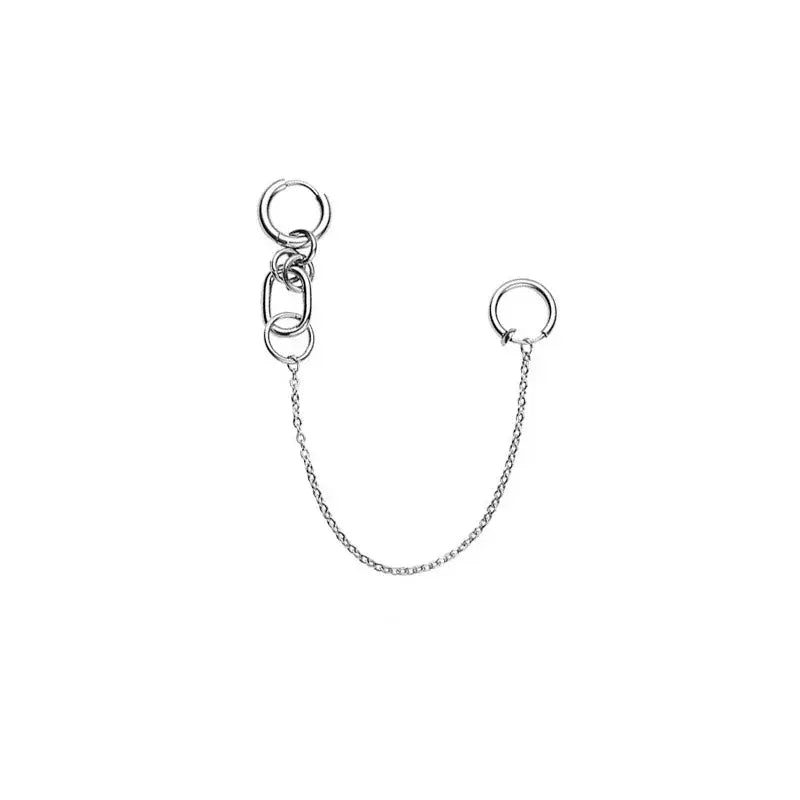 Silver chain lip clip earring with central oval ring and two circular hoops in nana okazaki shinichi punk chain set