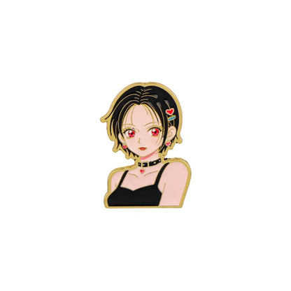 Gold-trimmed nana oosaki enamel lapel pin featuring an anime girl with black hair red eyes and heart accessories