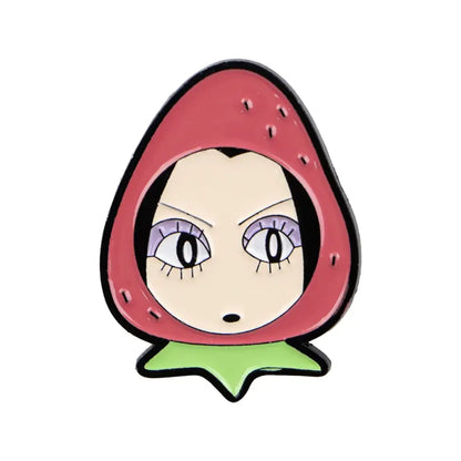 Nana oosaki enamel lapel pin featuring a red strawberry-shaped metal badge with cartoon face and black hair details