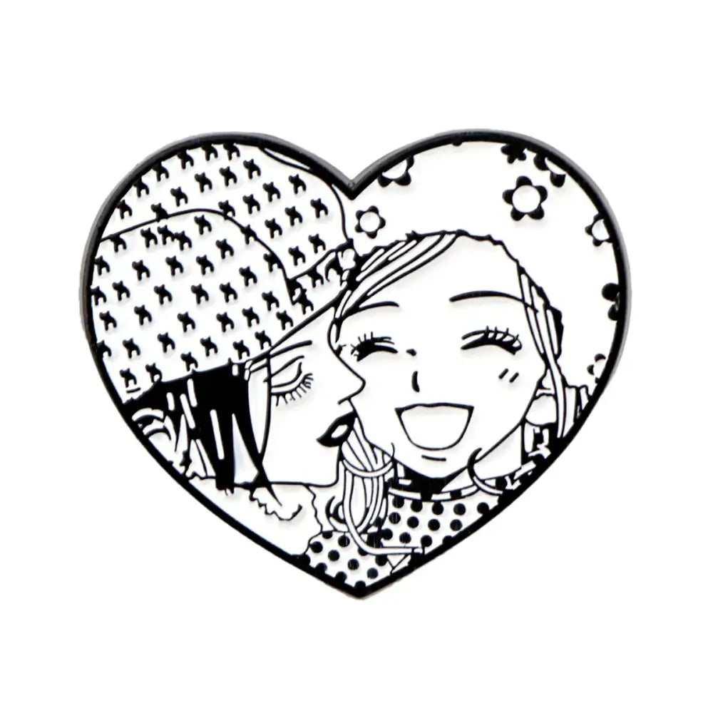 Heart-shaped nana oosaki enamel lapel pin with black and white anime girls kiss illustration on floral background