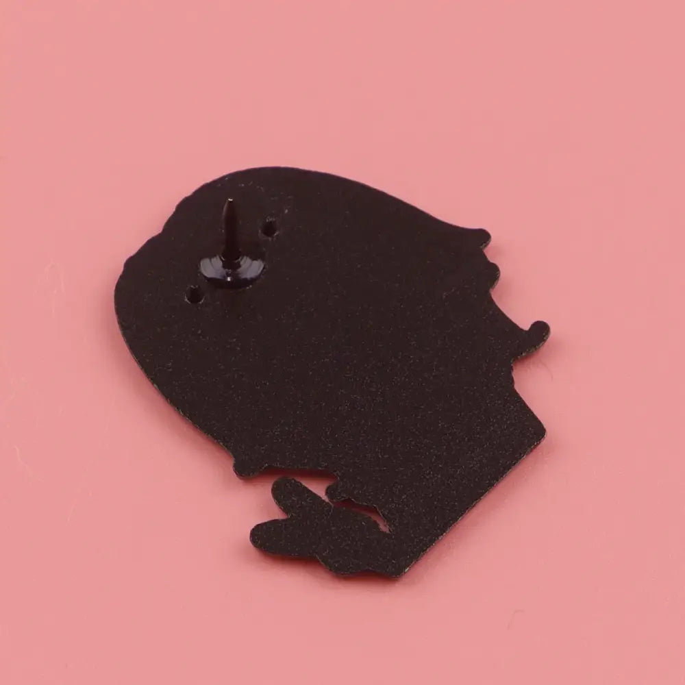 Black silhouette nana oosaki enamel lapel pin with short hair and hands clasped metal badge accessory