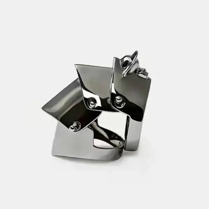 Nana oosaki knuckle ring in polished chrome metal armor with a bold style and angular geometric design