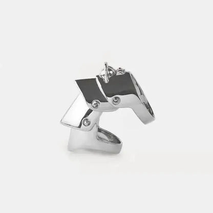 Stylish silver-toned nana oosaki knuckle ring with bold style metal armor design and rivet details in punk style