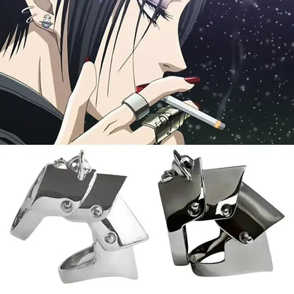 Silver metallic nana oosaki knuckle ring with angular geometric design and visible screws in bold style metal armor punk style