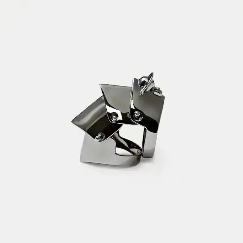 Nana Oosaki punk armor ring with angular facets and polished chrome finish in a multi-layer metal gothic design