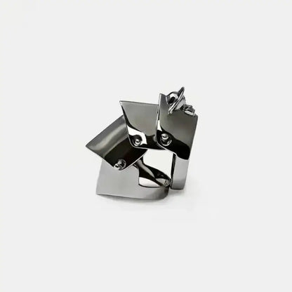 Nana Oosaki punk armor ring with angular facets and polished chrome finish in a multi-layer metal gothic design