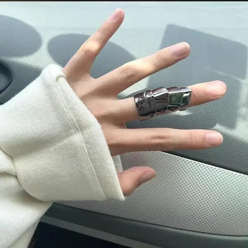 A sleek silver-toned punk armor ring designed as a detailed miniature truck in multi-layer metal gothic style