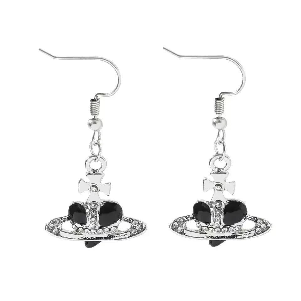 Silver-plated saturn planet earrings with black enamel, sparkling rhinestones, and cross in vivienne westwood style
