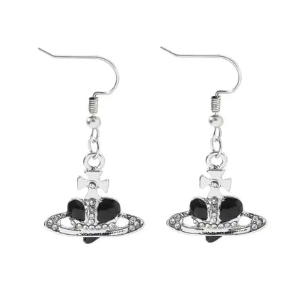 Silver-plated saturn planet earrings with black enamel, sparkling rhinestones, and cross in vivienne westwood style