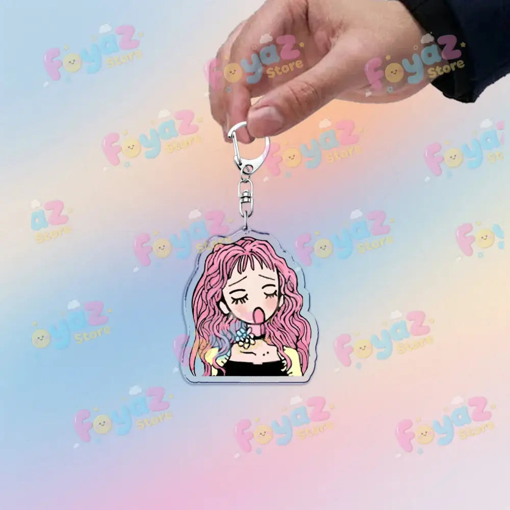 Nana osaki chibi acrylic keychain with pink hair and silver metal clasp used as a bag charm