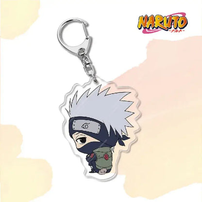 Clear acrylic naruto acrylic keychain featuring chibi kakashi hatake with silver hair as a bag charm accessory