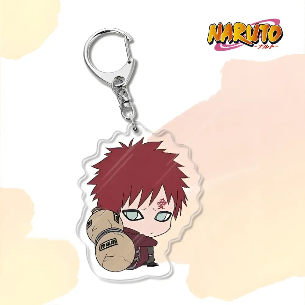 Clear acrylic naruto acrylic keychain featuring chibi red hair naruto holding tan scroll bag as bag charm accessory