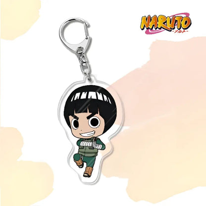 Clear acrylic naruto acrylic keychain with chibi black hair character in green outfit and white bandages bag charm accessory