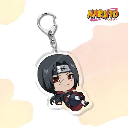 Clear acrylic naruto acrylic keychain bag charm accessory featuring chibi itachi uchiha with black hair red eyes and headband