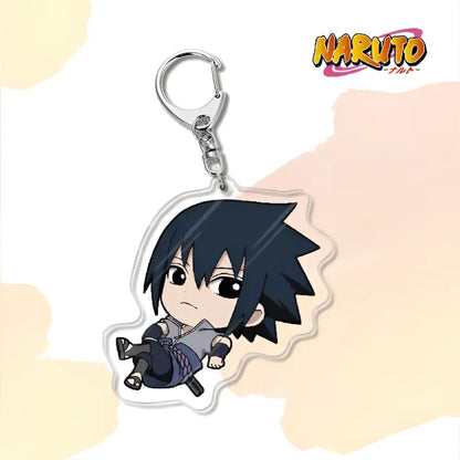 Clear acrylic naruto acrylic keychain featuring chibi sasuke in dark blue outfit as a bag charm accessory