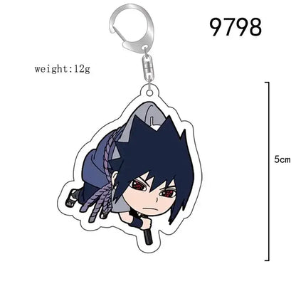 Silver-toned naruto acrylic keychain featuring chibi sasuke uchiha with dark blue hair and red eyes bag charm accessory