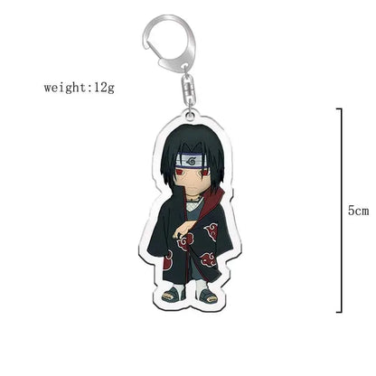 Black and red acrylic naruto acrylic keychain featuring chibi sasuke uchiha with headband and cloak bag charm accessory