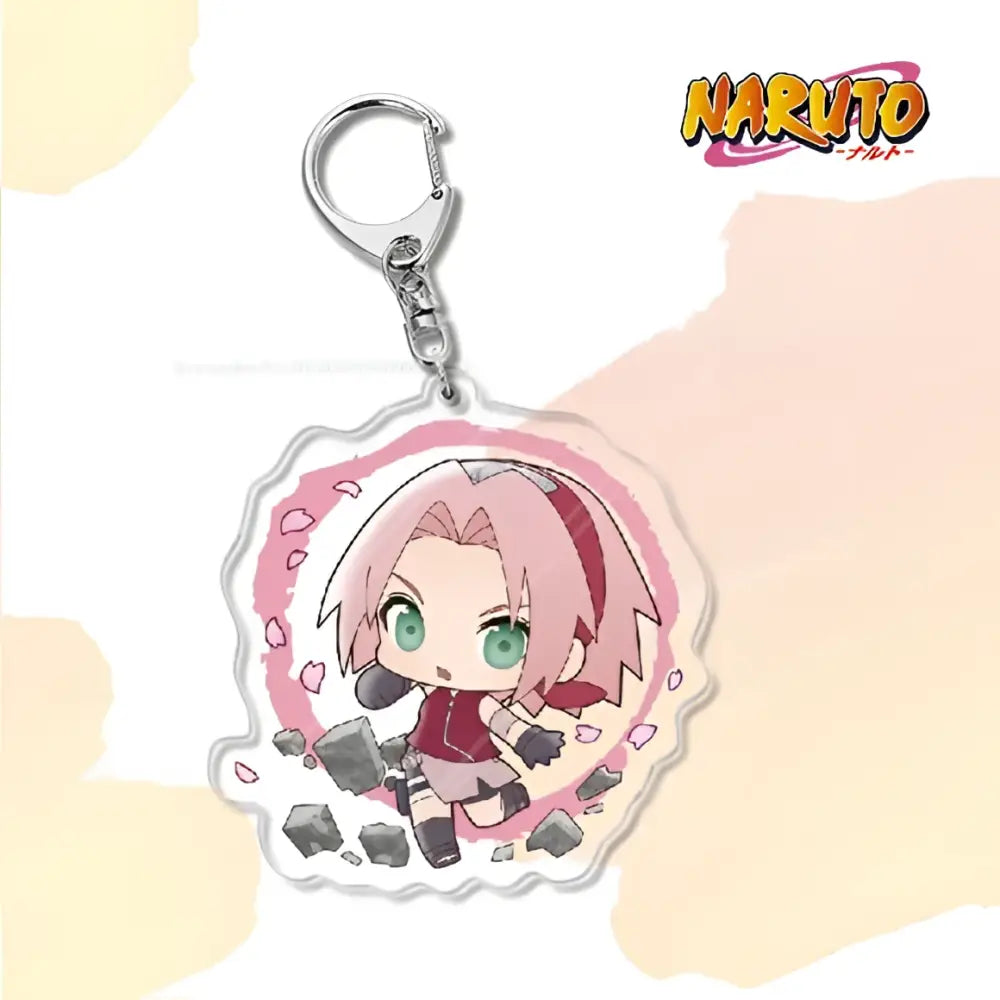 Pink and white naruto acrylic keychain featuring chibi sakura haruno with green eyes as a bag charm accessory