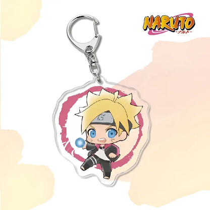 Clear acrylic naruto acrylic keychain with chibi boruto illustration and pink background as a bag charm accessory