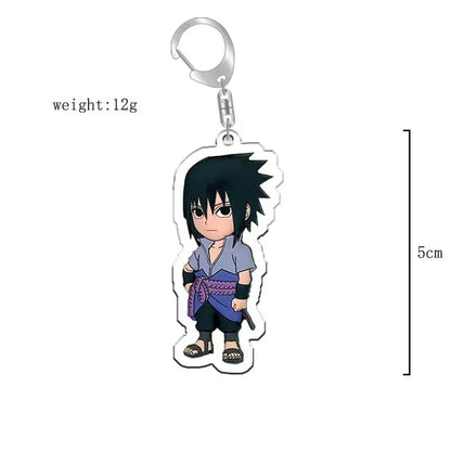 Chibi sasuke uchiha naruto acrylic keychain with black hair light blue shirt and purple sash bag charm accessory