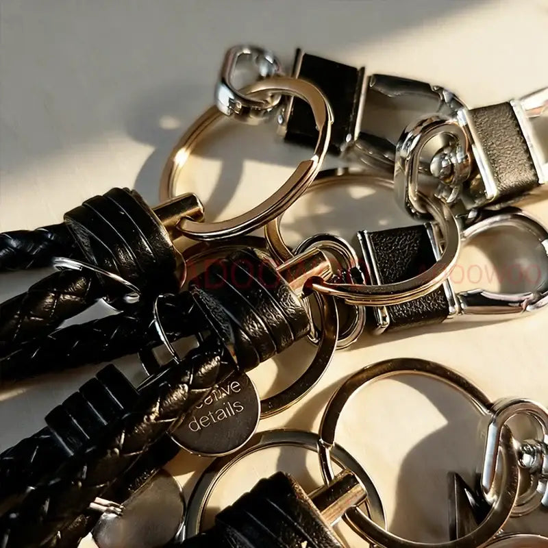 Black braided leather keychains with silver metal rings and buckles from naruto akatsuki alloy keychain red cloud leather rope